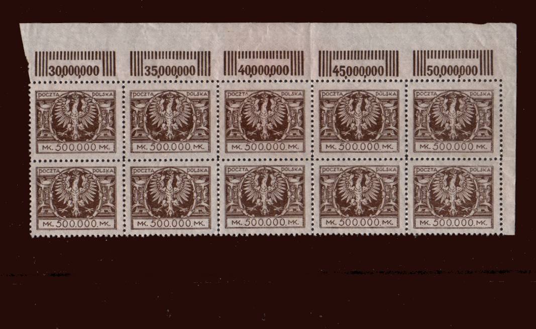 The 500,000m. Brown in a superb unmounted mint NE corner block of ten<br/>showing the sheet margins with numerals.<br/>SG Cat as mounted singles 70