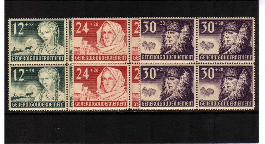 1st Anniversary of German Occupation set of three in superb unmounted mint blocks of four