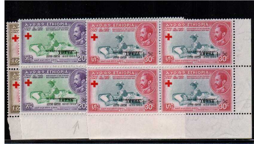 Red Cross set of three in superb unmounted mint corner blocks of four. The 20c+3c shows the variety 
